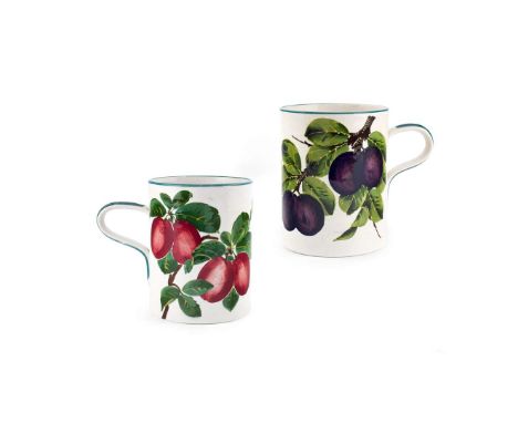   TWO LARGE 'PLUMS' MUGS to include a LARGE 'PURPLE PLUMS' MUG, glazed earthenware, painted and impressed maker’s mark WEMYSS
