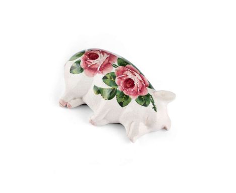   'CABBAGE ROSES' SLEEPING PIG glazed earthenware, painted and impressed maker’s mark WEMYSS   16.7cm long 