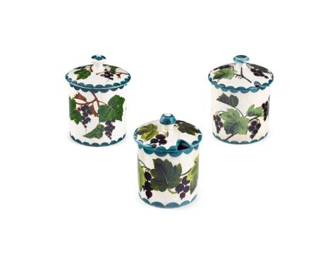   THREE 'BLACKCURRANTS' PRESERVE JARS & COVERS to include a LARGE 'BLACKCURRANTS' PRESERVE JAR & COVER, glazed earthenware, i