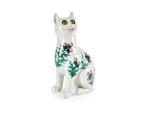   'THISTLES' CAT glazed earthenware, with applied glass eyes, impressed maker's mark WEMYSS, printed T. Goode & Co. retailer'