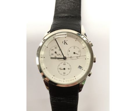 A gents Calvin Klein wristwatch with white dial, three subsidiary dials and date aperture, alongside a Thomas Calvi watch, an