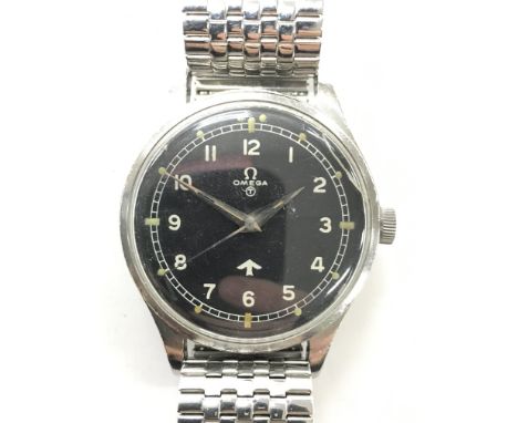 A rare and interesting Omega RAF 1953 military watch. This 17 jewel manual wind movement watch has dust cover, black dial wit