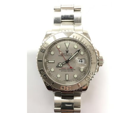 A gents Rolex oyster perpetual Yacht-Master chronometer wristwatch. The silver tone dial presenting luminous hour indicators,