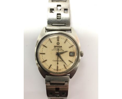 A vintage Omega Constellation automatic chronometer with date aperture and baton numerals,  mounted on a stainless steel stra