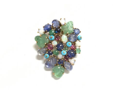 An 18ct brooch set with various gems including Opal and ruby etc. 14.09g