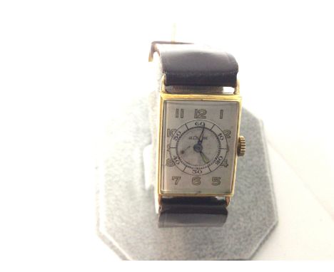 A vintage gold Jaeger leCoultre watch in need of a service. Not seen running.