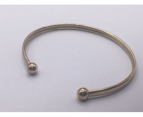 A 9carat gold bangle weight 3g