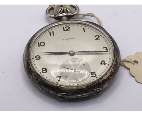 A silver cased Longines button wind pocket watch the reverse with engraved Zent. Seen working.