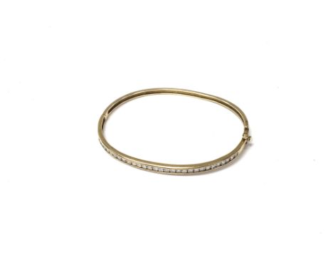 A 9ct gold stone set bangle approx 6.93 grams. Shipping category B.