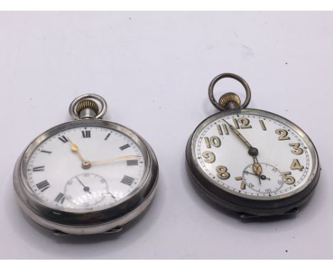 A Military style pocket watch with illuminated numerals and one other button wind pocket watch both seen working. (2)