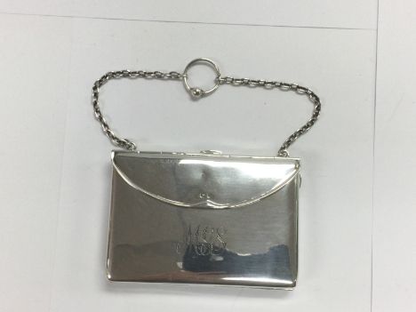 A silver combination coin purse and card case, Birmingham 1910. Shipping category A.