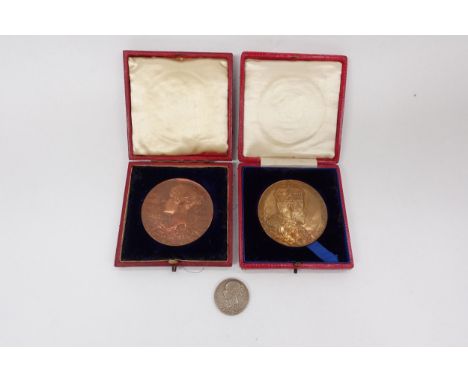 A Victoria Diamond Jubilee cased bronze medal, a small white metal medal and a cased Edward VII Coronation medal (3) 