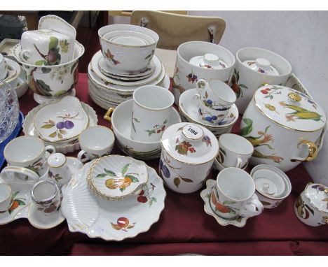 A Large Collection of Royal Worcester 'Evesham' Oven to Table Pottery, including storage jars, serving dishes, casserole and 