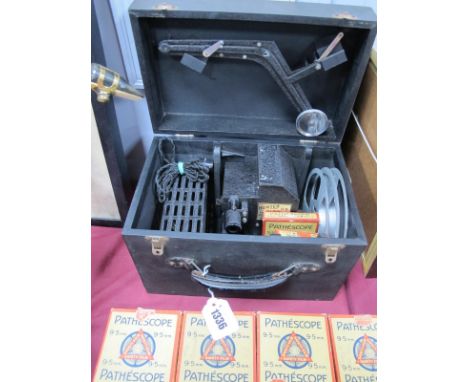 An Early XX Century Hunter Projector in Original Travel Case; together with six 9.5mm films including Mickey Mouse in their o