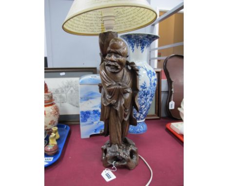Chinese Hardwood Lamp, circa 1930's featuring Elderly Gentleman Holding Bird in Hand, 41.5cm high excluding fitting and shade
