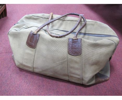 A Vintage Leather Handled Canvas Travel Holdall Bag, base 60cm wide.