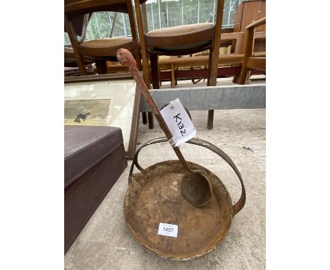 A VINTAGE HANGING SKILLET PAN COMPLETE WITH LADEL 
