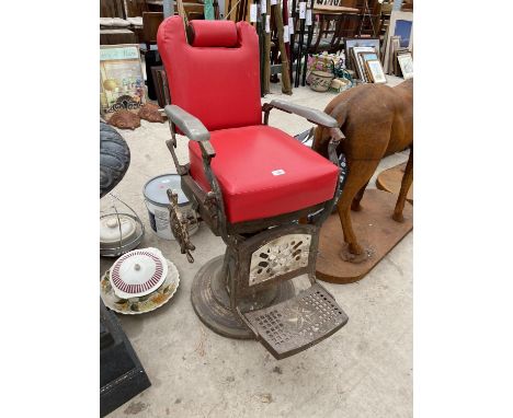 A VINTAGE RECLINING DENTIST CHAIR 