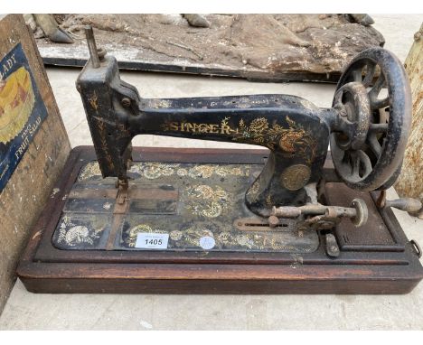 A VINTAGE SINGER SEWING MACHINE 
