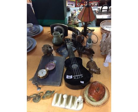 A MIXED VARIETY TO INCLUDE BRASS AND CERAMIC  ORNAMENTS INCLUDING A NOVEL HOW WE KEPT THE SEA AND A LURPAK TOAST RACK ETC 