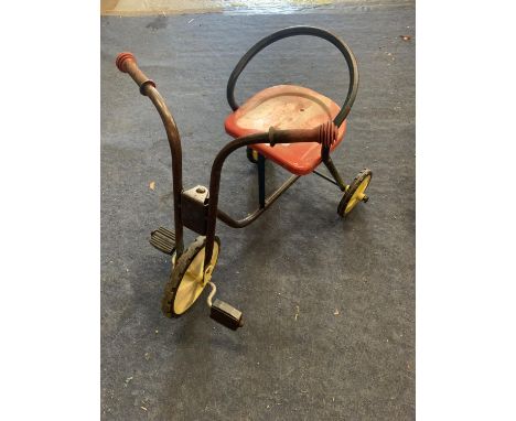 A VINTAGE TRICYCLE 