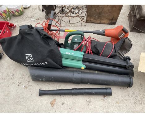 AN ASSORTMENT OF GARDEN TOOLS TO INCLUDE A FLYMO GRASS STRIMMER, A LEAF BLOWER AND A HEDGE TRIMMER 