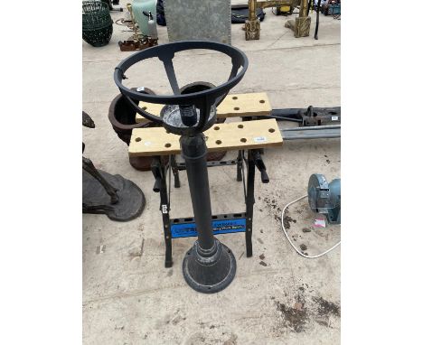 A NUTOOL WORK BENCH AND A FURTHER LAMP 