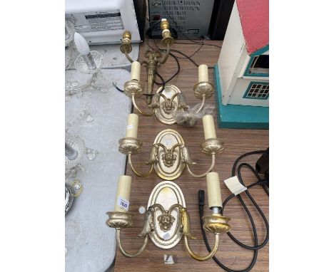 A GROUP OF FOUR DECORATIVE WALL LIGHT FITTINGS 