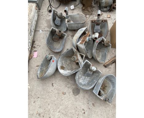 AN ASSORTMENT OF VINTAGE CAST WATER DRINKERS 