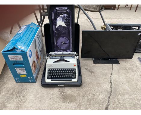 AN ASSORTMENT OF ITEMS TO INCLUDE A SNAP ON CLOCK, A TELEVISION AND AN OLYMPIA TYPE WRITER ETC 
