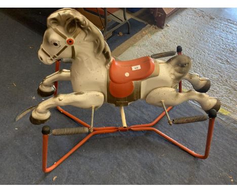 A VINTAGE METAL ROCKING HORSE ON SPRINGS - HANDLES MISSING 