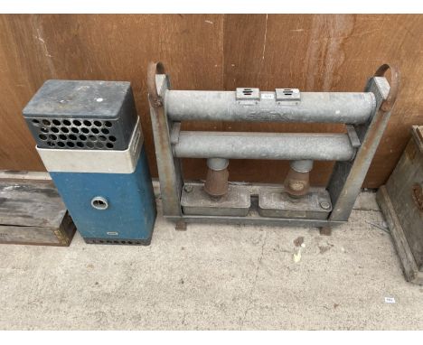 A VINTAGE ELTEX PARAFIN GREENHOUSE HEATER AND A FURTHER ALADDIN HEATER 