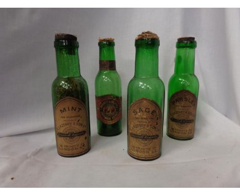 A COLLECTION OF 4 VINTAGE GREEN GLASS HERB BOTTLES 