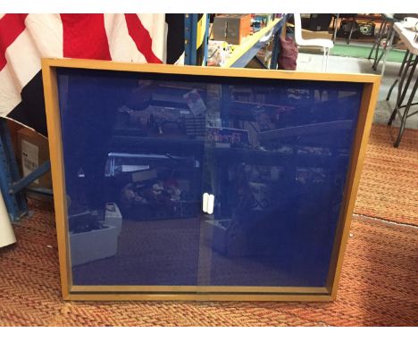 A LARGE DISPLAY CABINET WITH BLUE BAIZE AND TWO SLIDING GLASS DOORS 40" X 30" 