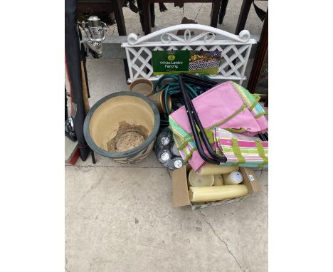 AN ASSORTMENT OF ITEMS TO INCLUDE PLANTERS, A HOSE PIPE AND CANDLE HOLDERS ETC 