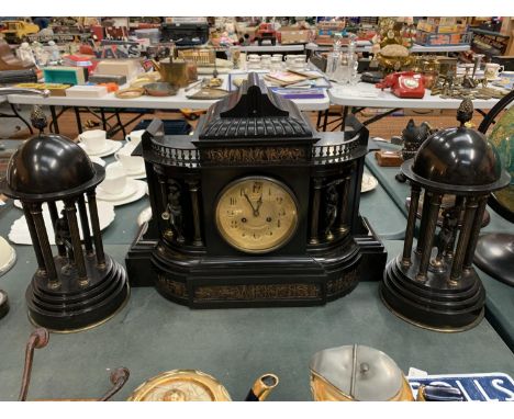 A LARGE DECORATIVE POLISHED SLATE OVER MANTEL CLOCK WITH EMBOSSED COPPER DEPICTING ROMAN SCENES 50CM WIDTH 38CM HEIGHT WITH T
