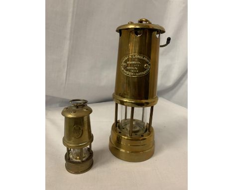 TWO BRASS MINERS LAMPS ONE HOCKLEY LAMP AND LIMELIGHT COMPANY COLLIERY NO 8721 SERIAL 15760 AND A SMALLER EXAMPLE 