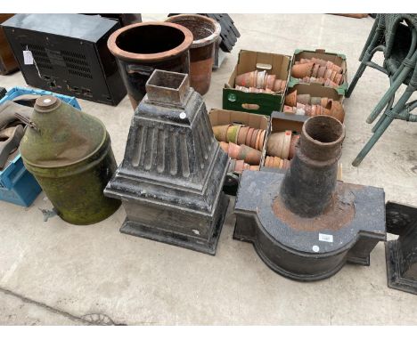 TWO VINTAGE CAST IRON GUTTER HOPPERS AND A VINTAGE OIL DRUM WITH TAP 