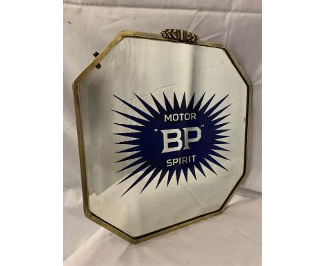 A MOTOR 'BP' SPIRIT BRASS FRAMED MIRROR 36CM X 37.5CM (CHIP TO GLASS) 