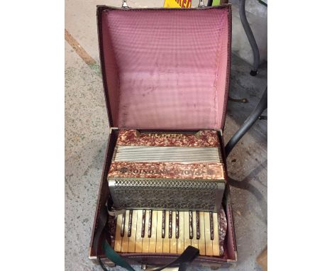 A VINTAGE PAULO ANTONIO ACCORDIAN IN A LEATHER CARRYING CASE 