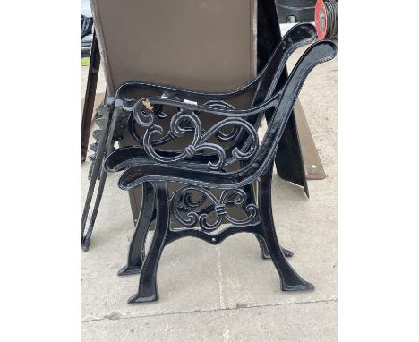 A PAIR OF DECORATIVE CAST BENCH ENDS 