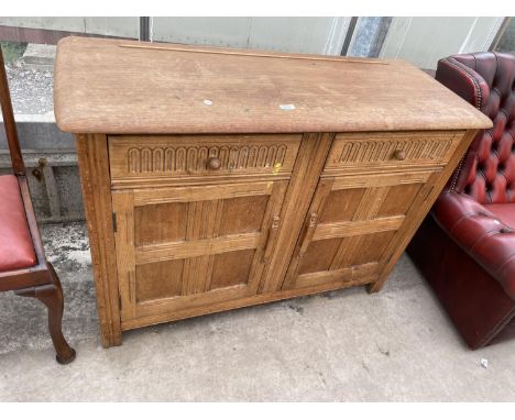 A LIGHT OAK PRIORY STYLE DRESSER BASE, 48" WIDE 