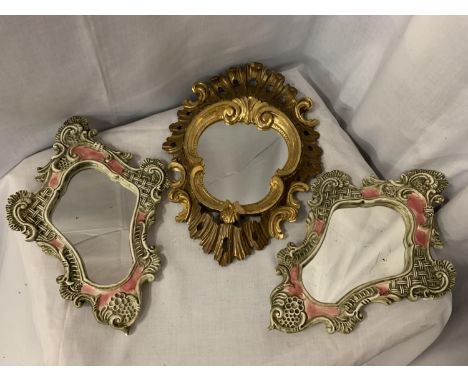 A PAIR OF ORNATE CERAMIC MIRRORS AND A FURTHER GILT FRAMED MIRROR 