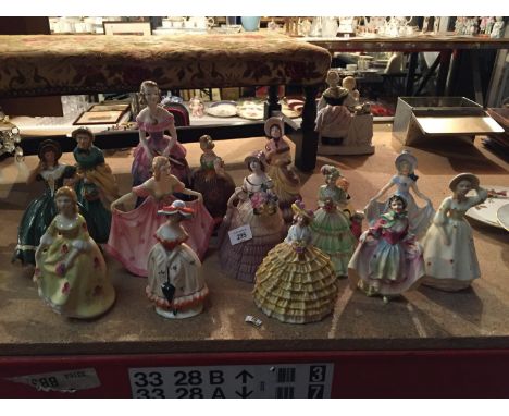 A COLLECTION OF CERAMIC FIGURINES 