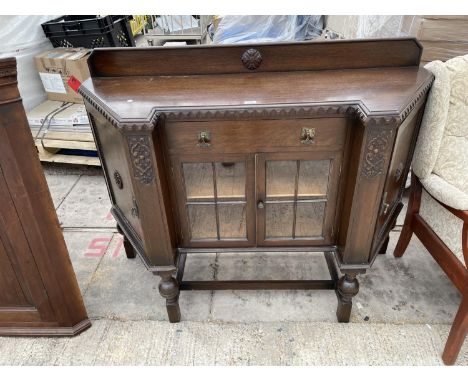 AN EARLY 20TH CENTURY OAK "THE CABINET SIDEBOARD" REG. NO. 719070, 54" WIDE 