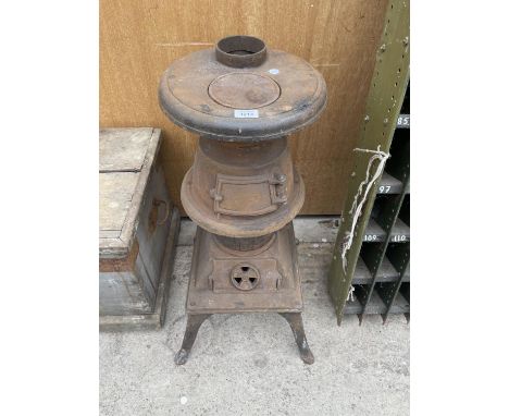 A VINTAGE CAST IRON POT BELLIED STOVE (H:75CM) 