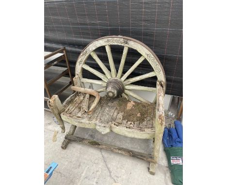 A VINTAGE WOODEN GARDEN BENCH WITH CART WHEEL BACK 
