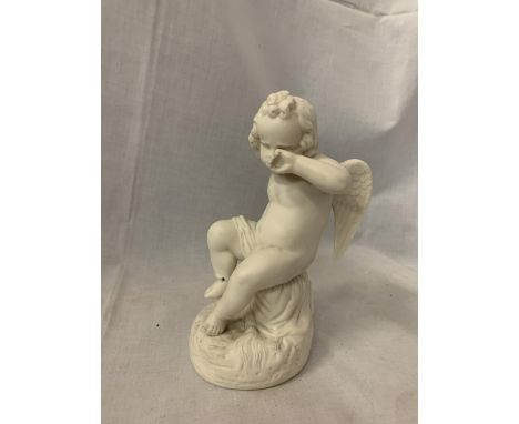 A WHITE CERAMIC CHERUB 