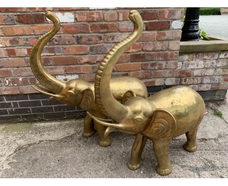 A PAIR OF VERY LARGE BRASS ELEPHANTS HEIGHT TO TOP OF TRUNK 106CM AND 90CM LONG 