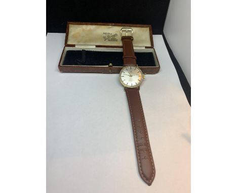 A 9 CARAT GOLD TISSOT SEASTAR SEVEN WRIST WATCH (ENGRAVED ON BACK TO 1969) WITH PRESENTATION CASE 